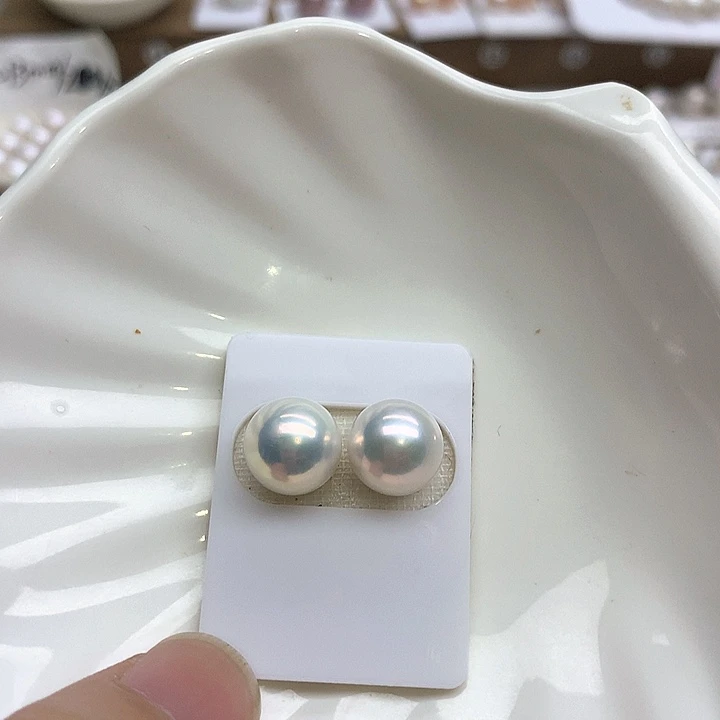 丫***伢定制淡水珍珠银S925镶嵌耳饰