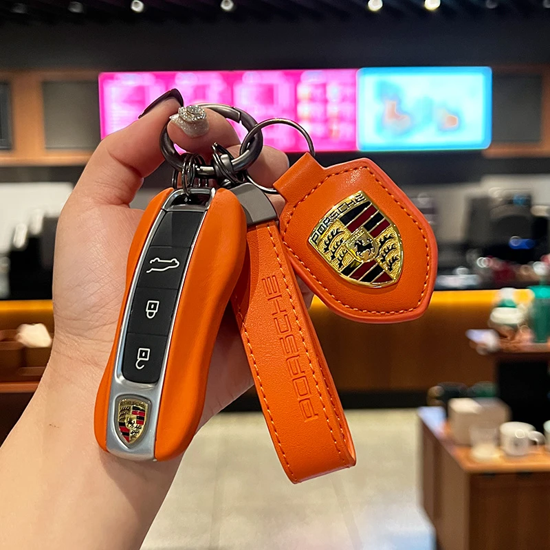 保时捷爱玛橙真皮钥匙壳卡宴Macan帕拉梅拉718Taycan911钥匙扣套