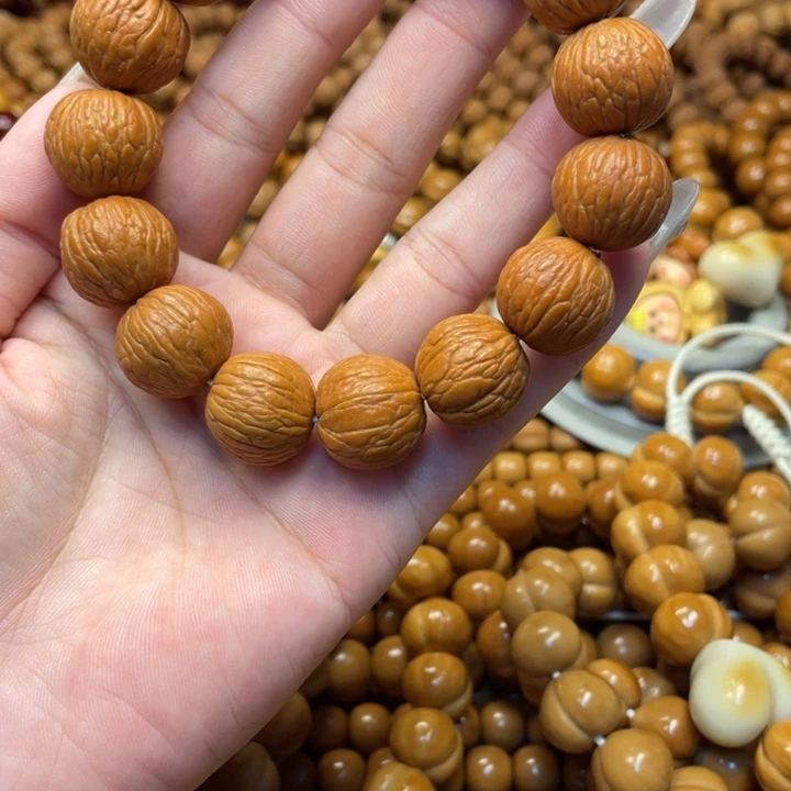 懵****核桃猴头凤羽手持