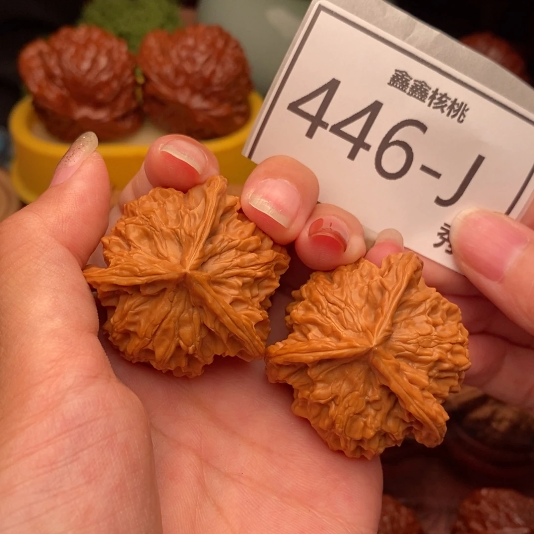 披***吗桃核把件盘山奔40……