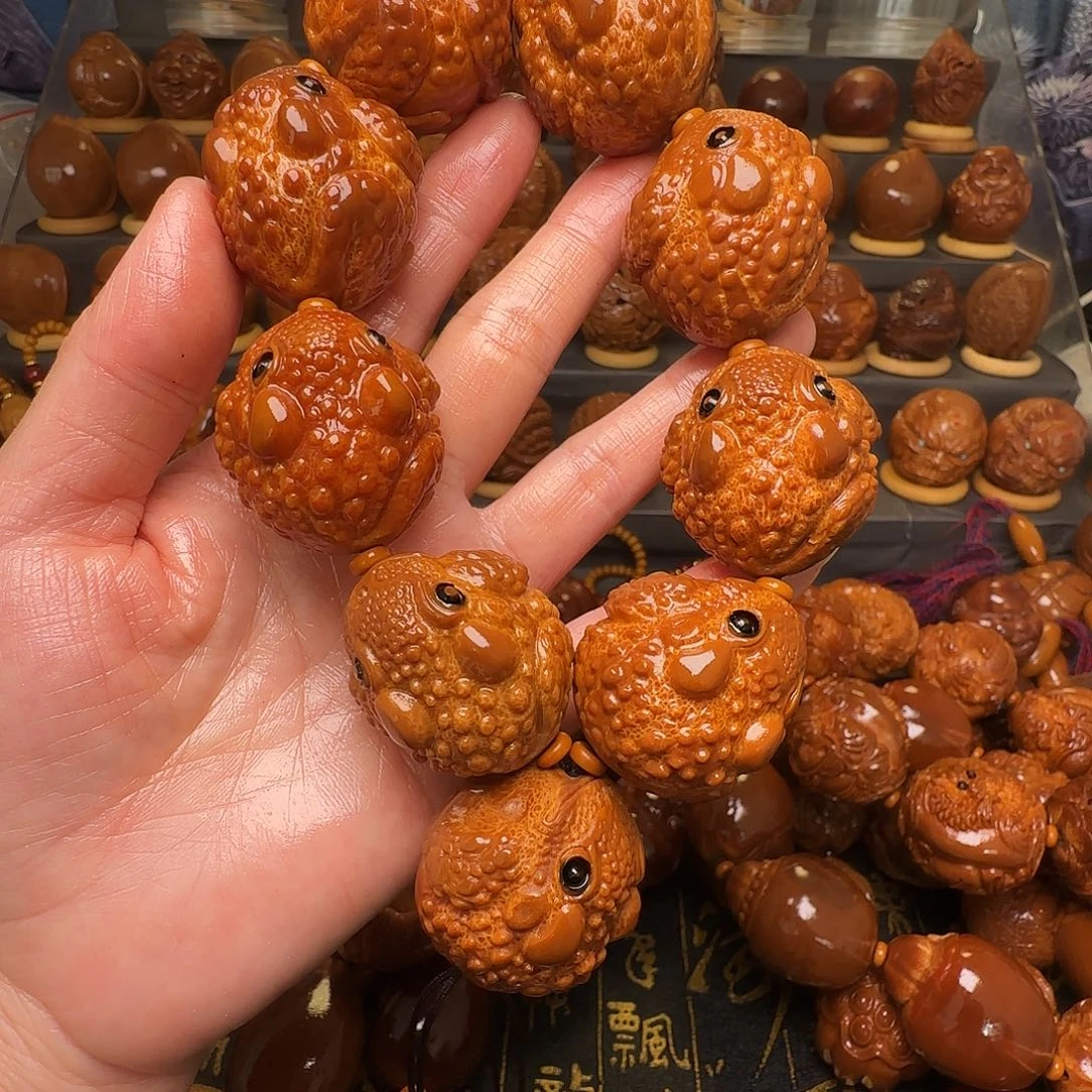 哪***经手串/手链橄榄核金蝉一条