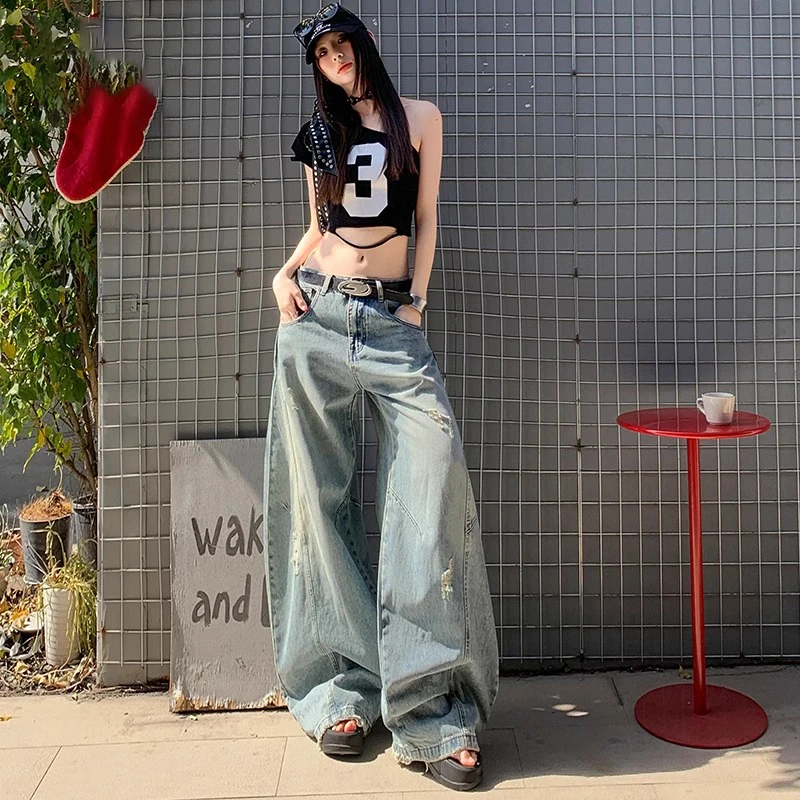 美式做旧破洞弯刀牛仔裤女2025春夏新款设计感水洗宽松阔腿拖地裤