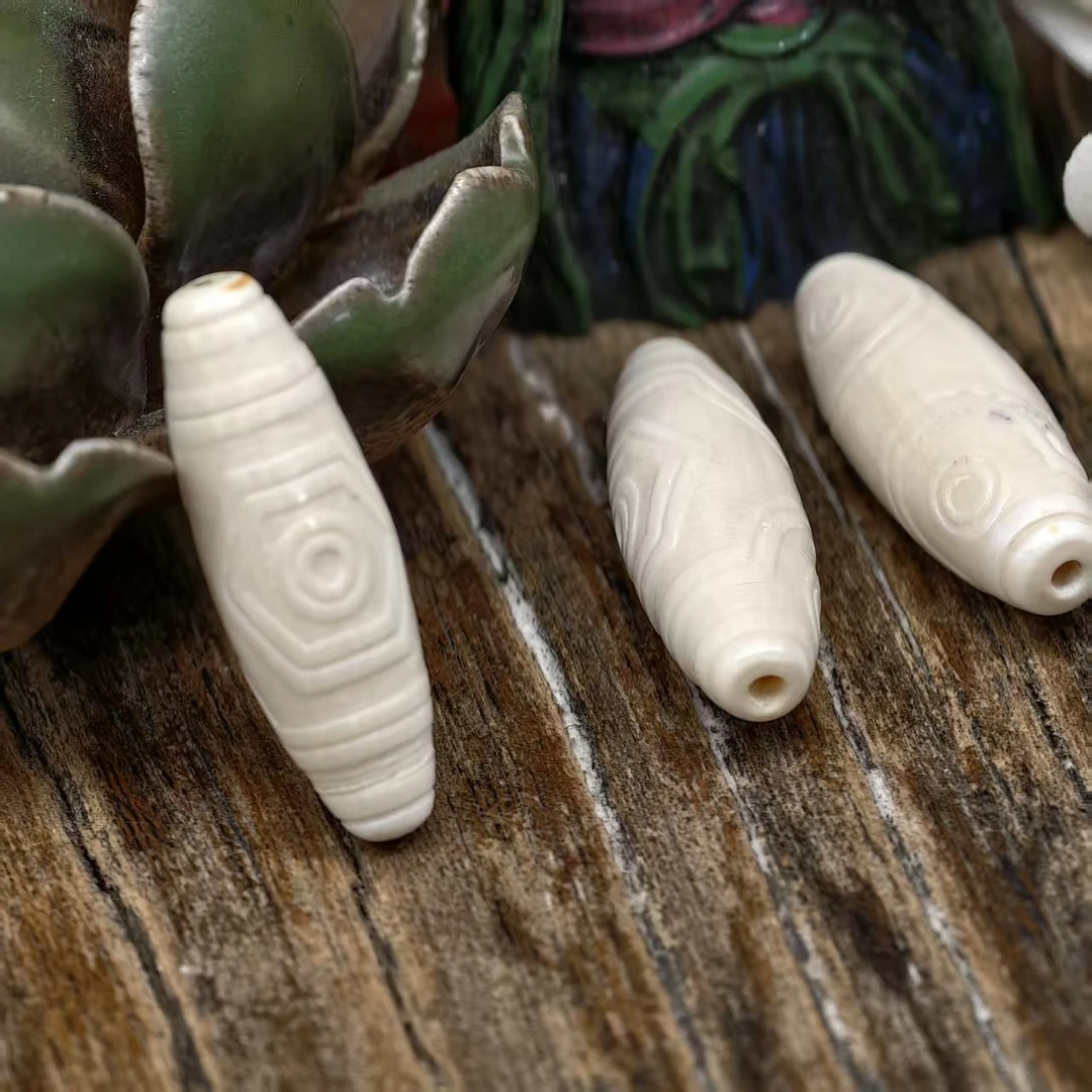 T217【三眼天】精猛犸象牙27*9左右文玩锁骨珠吊坠精工配饰（发其一）