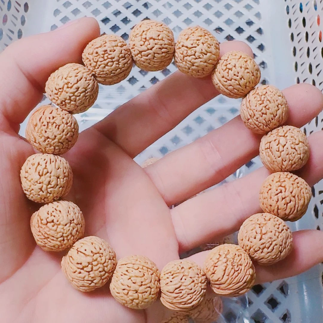 桃核吊坠凤尾手串