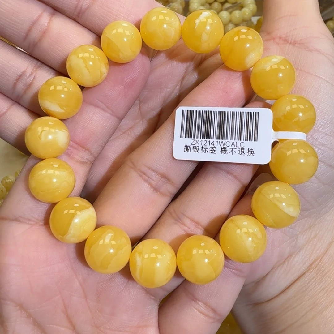 琥珀未镶嵌珠宝奇石13m焦皮同料橘黄花蜡圆珠手串21.2