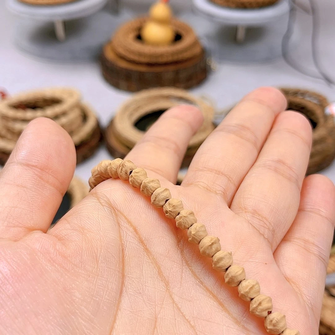 柏香籽/百香籽吊坠芜****华