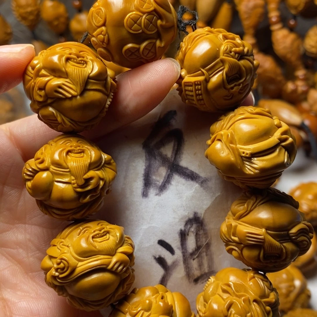 锦***房手串/手链橄榄核上色财神精品