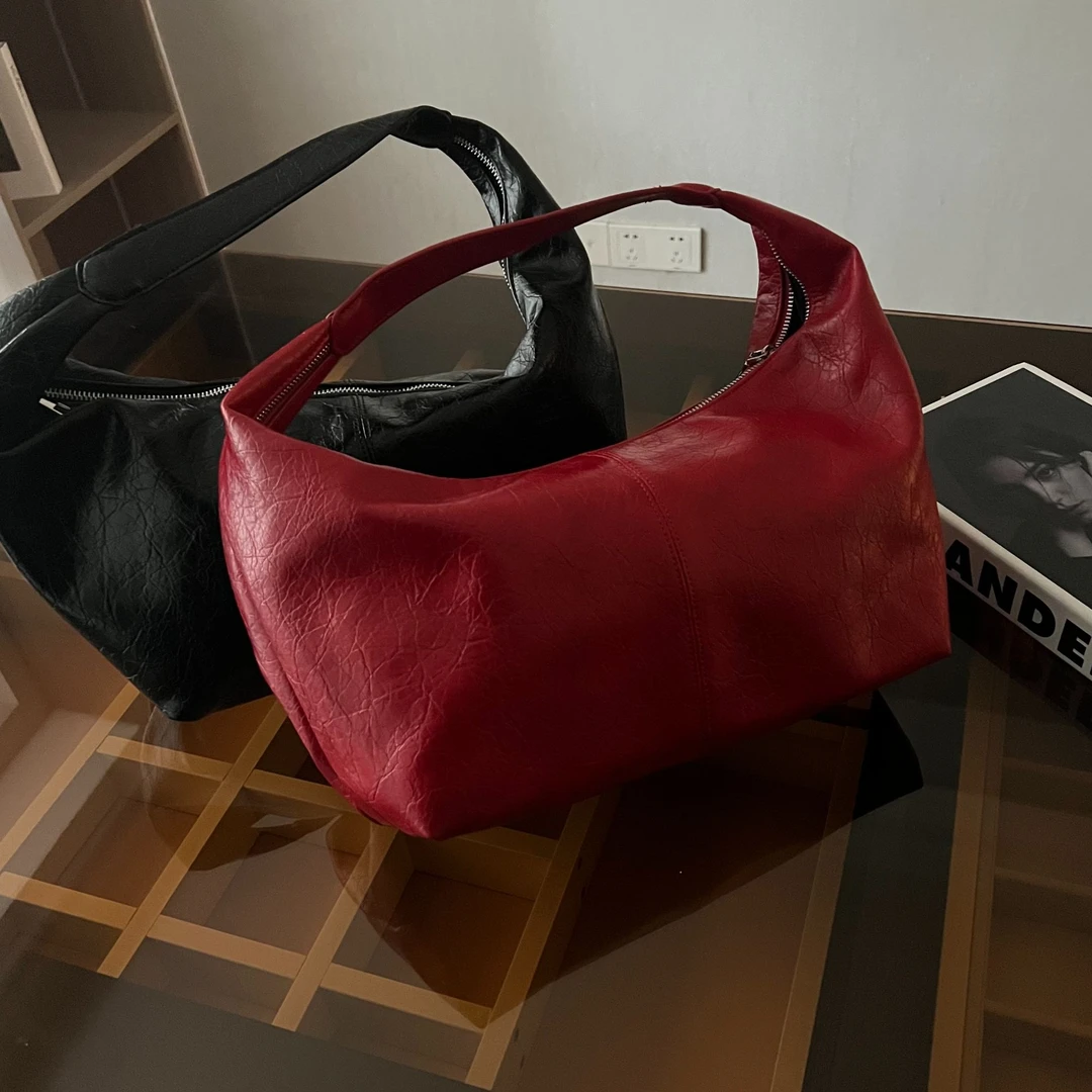 YUXI▪️2025韩版复古饺子包女软皮百搭小众高级感简约通勤手拎包