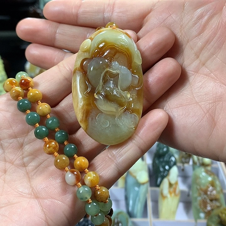 蛇纹石玉手把件未镶嵌独**忆