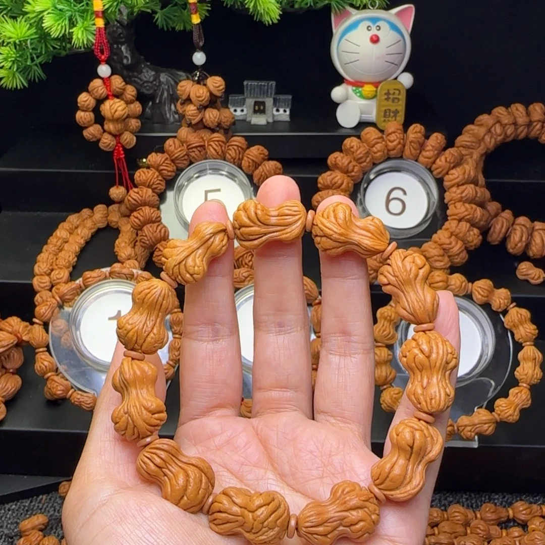 疯***那手串桃核花生手串