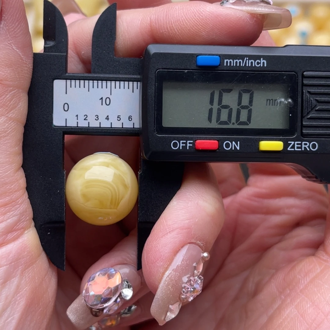 辰***琥珀未镶嵌裸石蜜蜡圆珠鸽