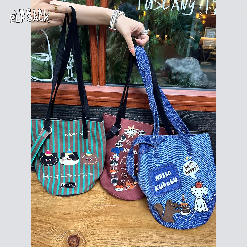 妖精的口袋撞色条纹猫咪水桶包2025年新款单肩通勤包包25248602