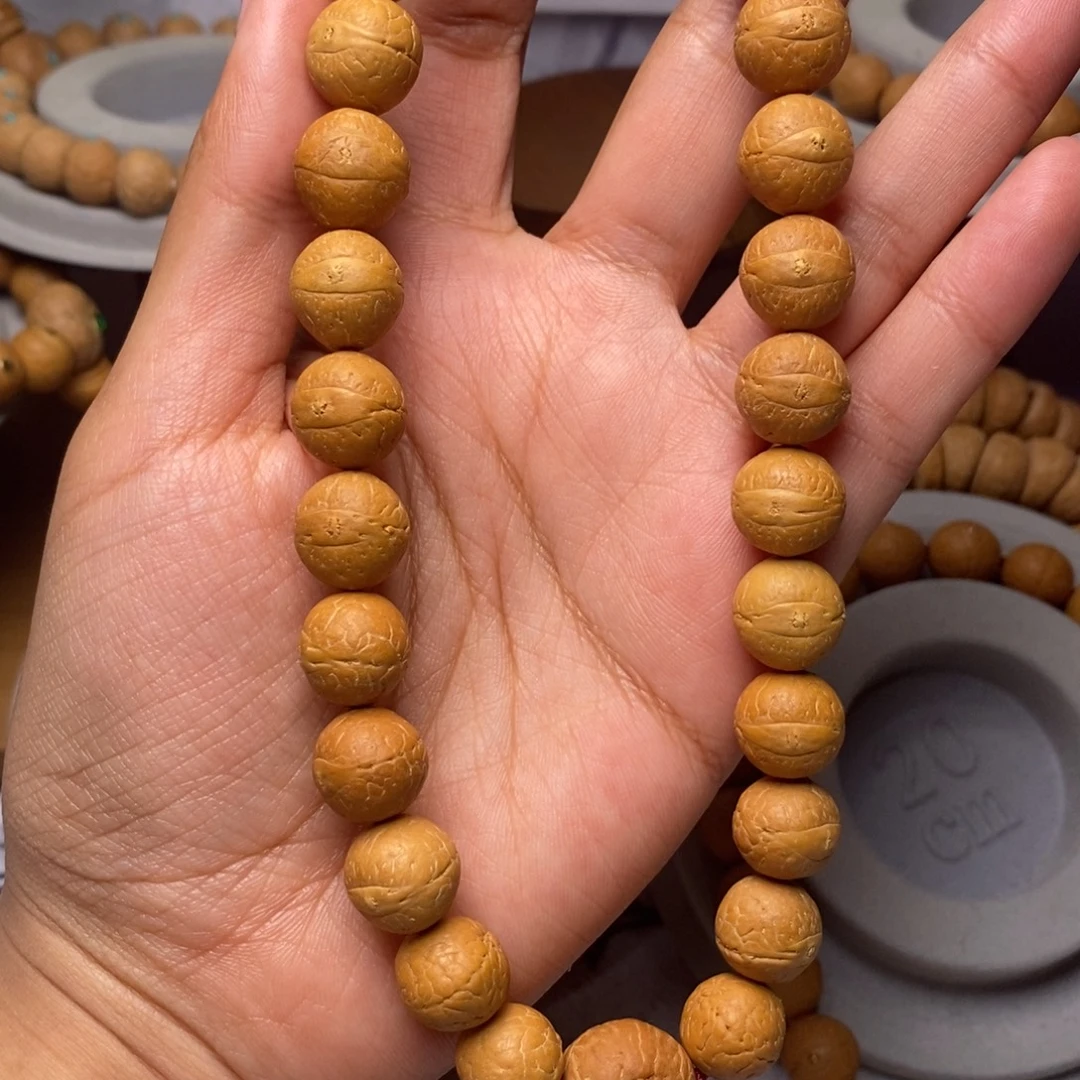 凤眼菩提吊坠手持