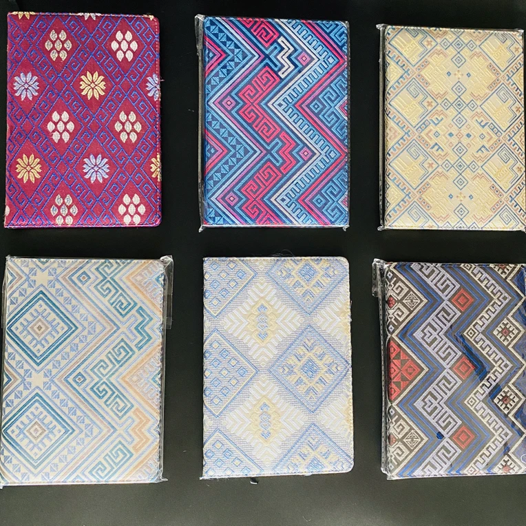 谭湘光 | 广西非遗手工壮锦笔记本饰品