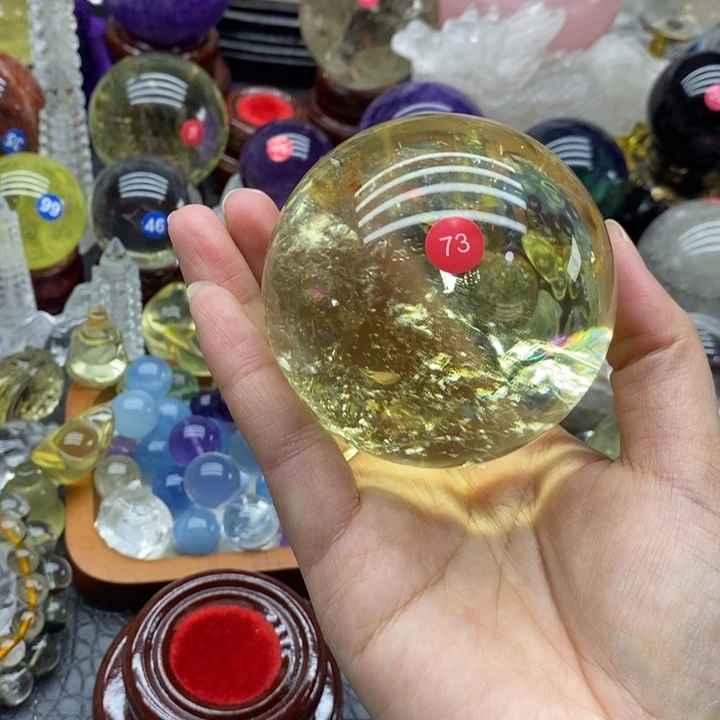 诺***羊石材天然黄水晶球