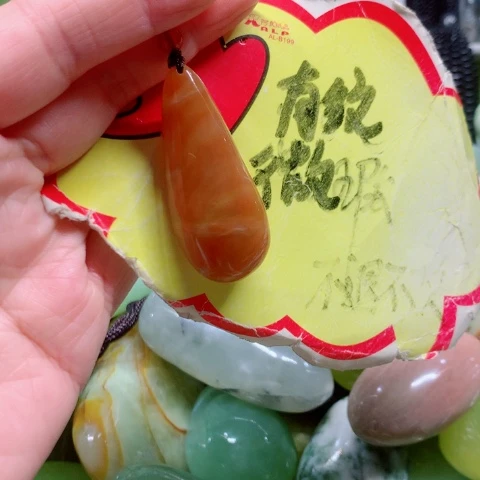 未镶嵌蛇纹石玉手把件