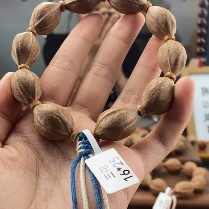 橄榄核吊坠老*巴梅林铁