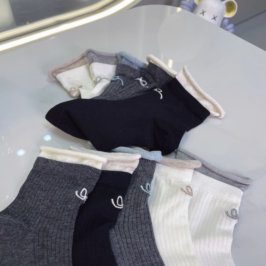 2025款可爱卷边蝴蝶结袜子女中筒春秋ins风运动风女士夏款纯棉