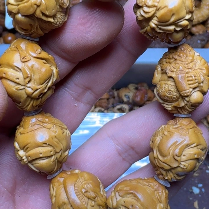 橄榄核手串你的电话打