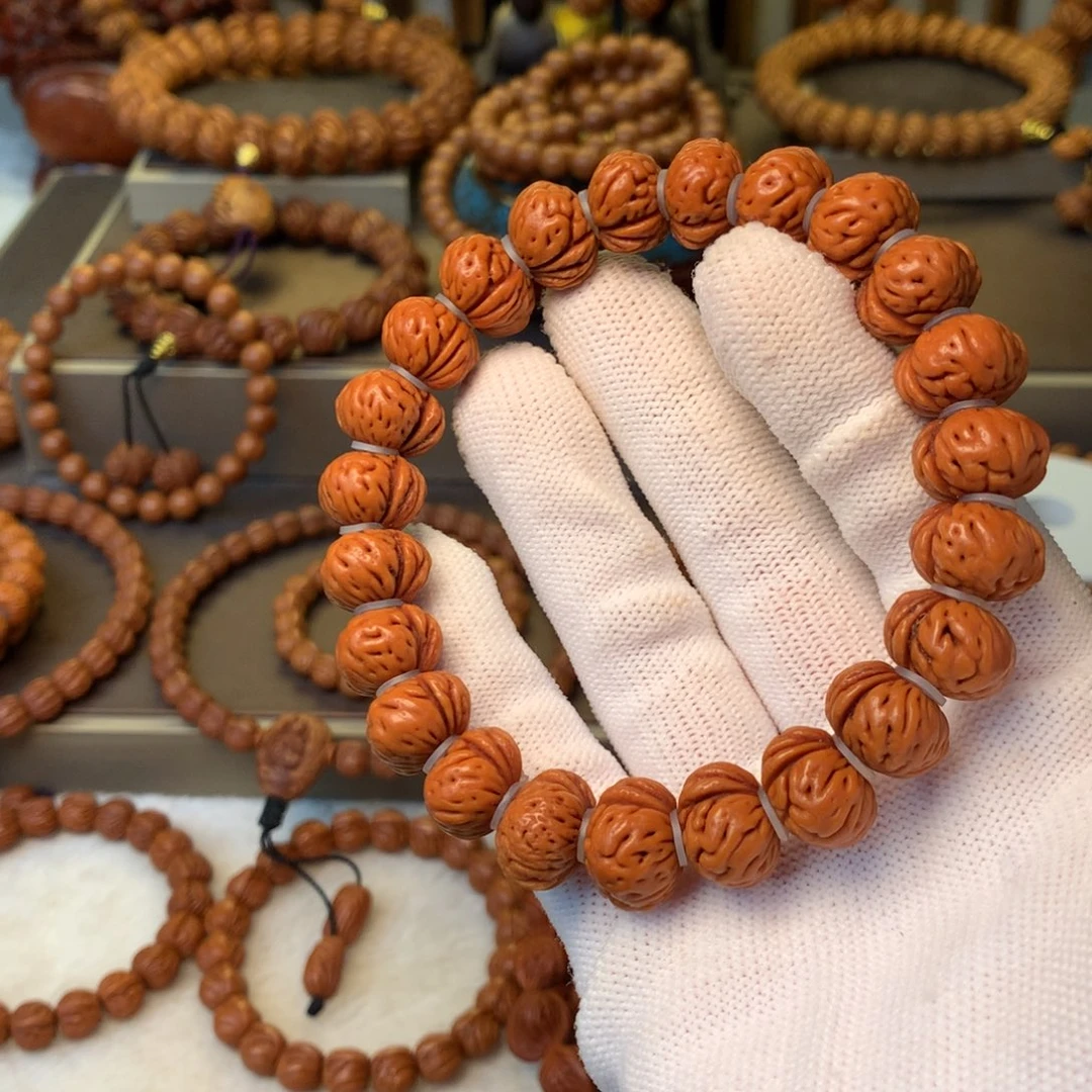 洋***哥手串桃核秦岭龙纹