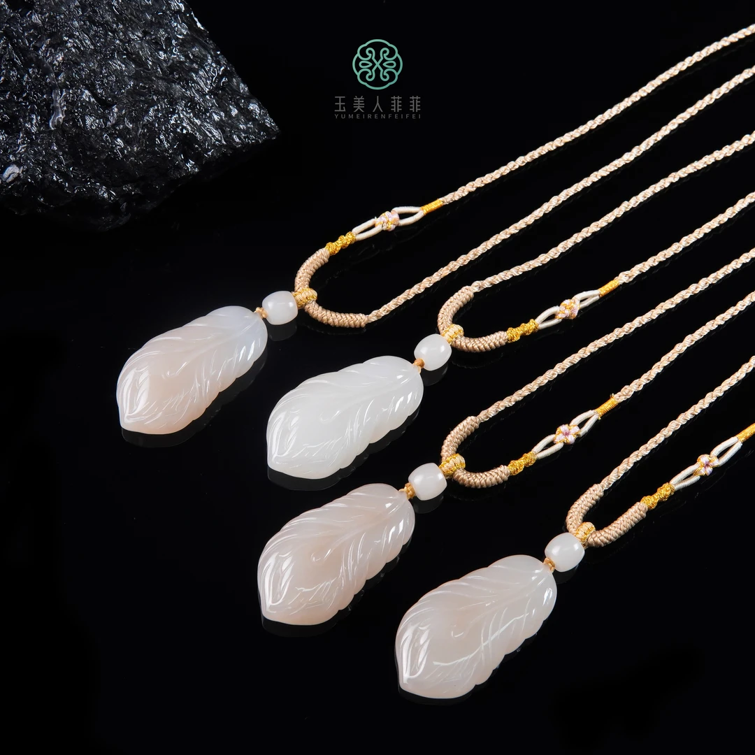 HD石惑珠宝^和田玉羽毛吊坠约23*43mm*多样性发一