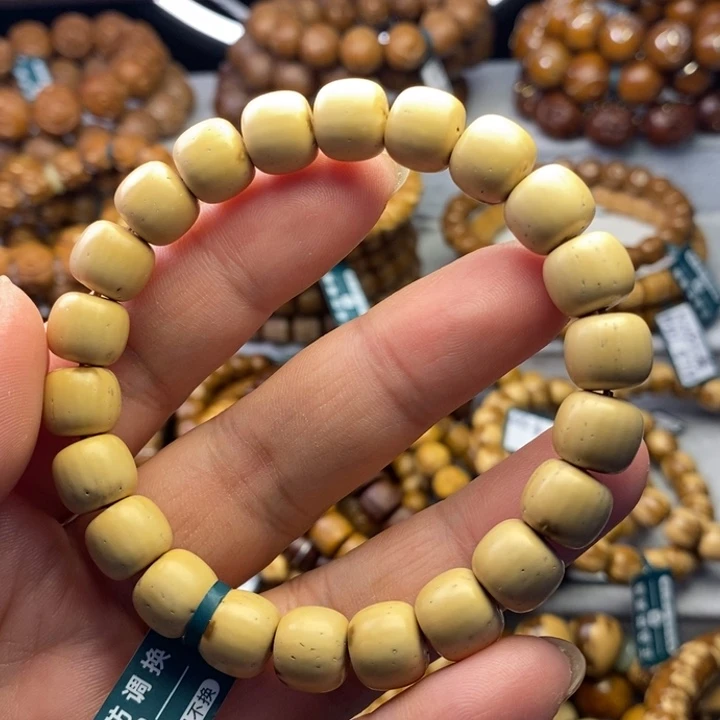 紫金鼠手串铃****?紫金鼠实心老型白巧10