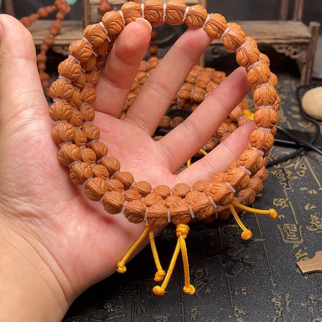 桃核吊坠玉龙手持