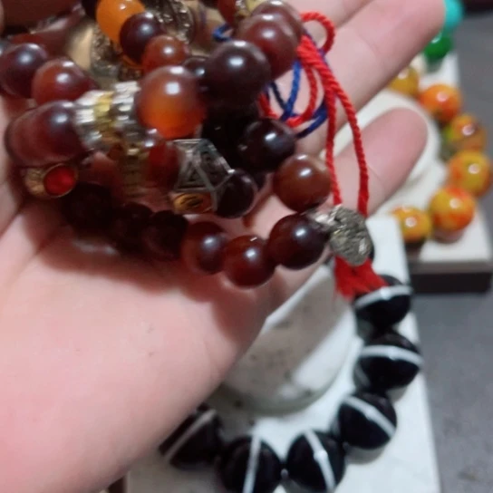 龙***宝冒冒卡1.0黑色长链带铜牌