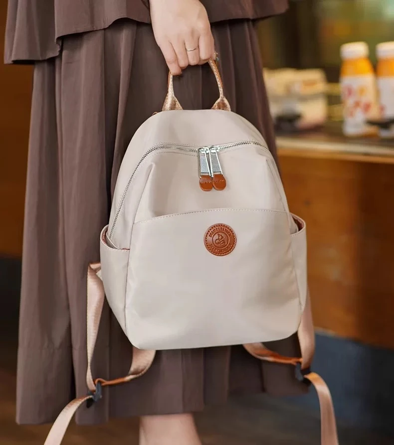 复古防水双肩包女2025新款百搭女包大学生书包便携旅行妈咪小背包