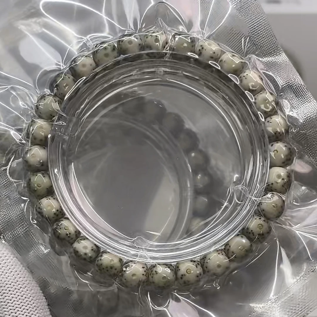 120/ 石玉料绿包白星月菩提手串 8×7mm