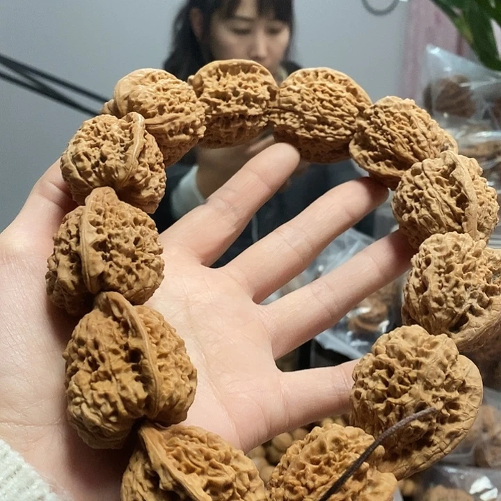 文玩核桃把件38官帽手持油