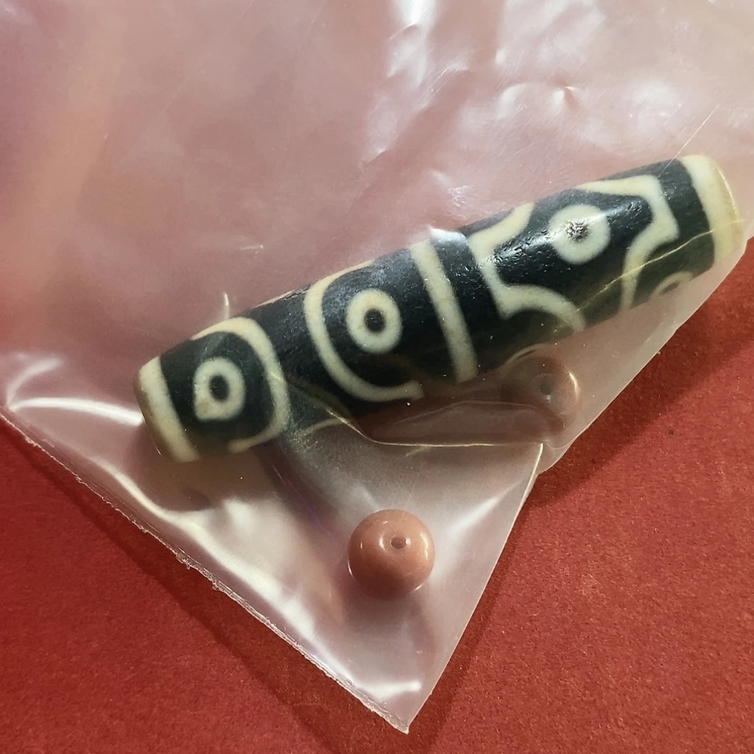 梵***院玛瑙/玉髓未镶嵌颈饰行运十二眼