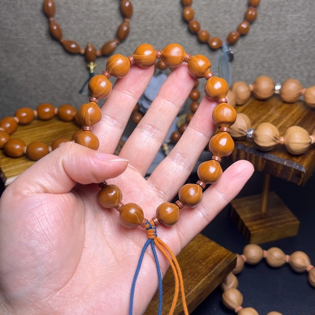 咔***啦橄榄核手串/手链梅林水晶核