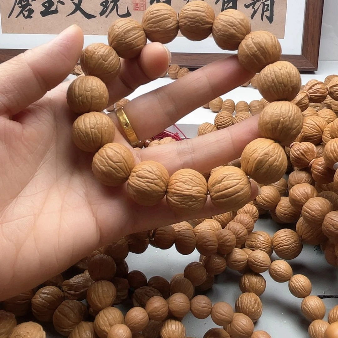 核桃用****8老树猴头手串1.9聚宝盆