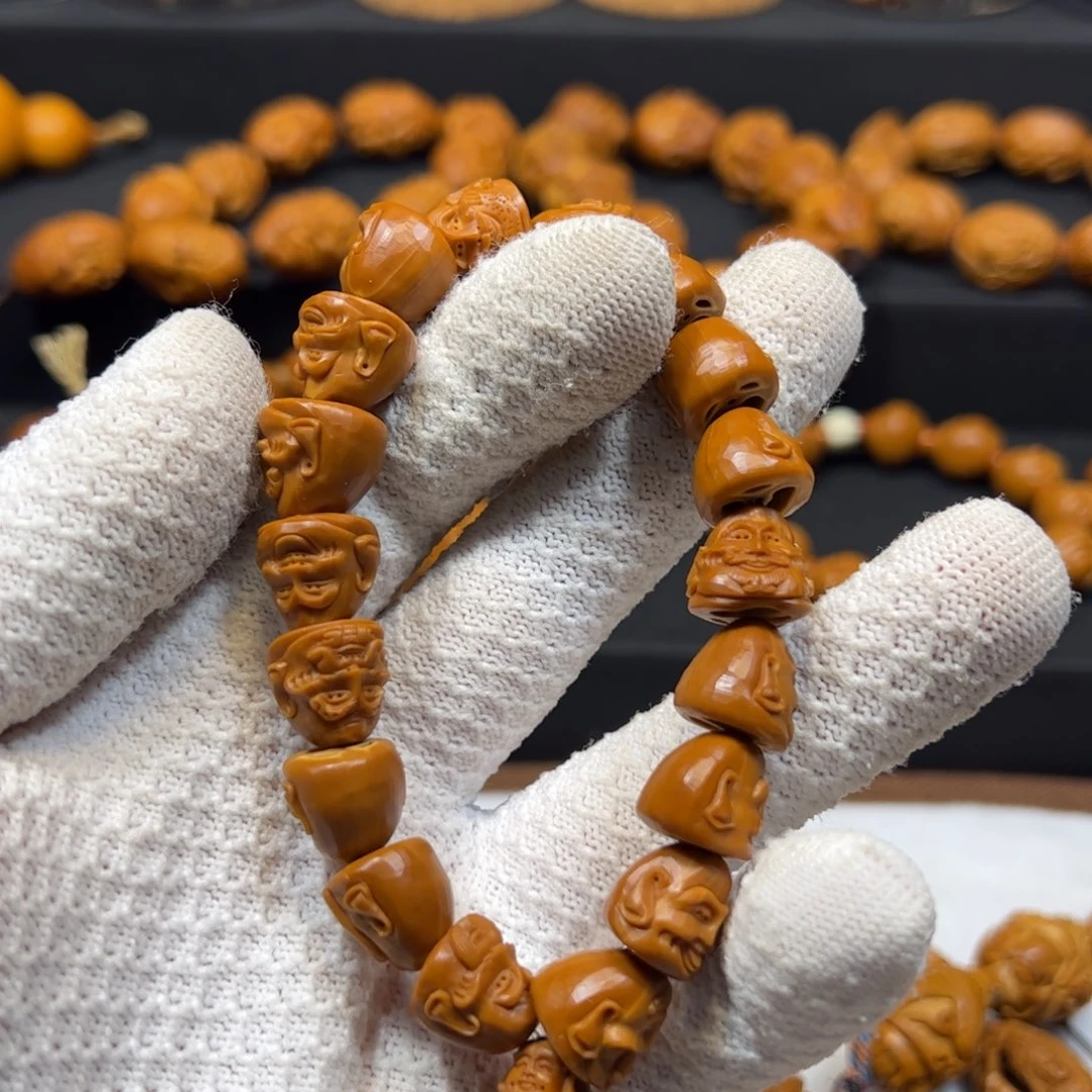 甦***手串/手链橄榄核1.25核尖雕刻十八罗汉