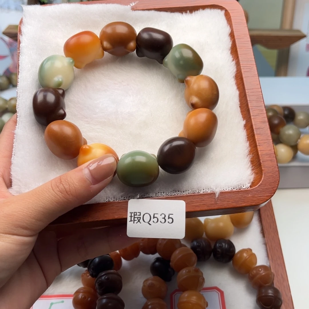 菩提根/象牙果手串辣****绣20mm猫头一次瑕Q535