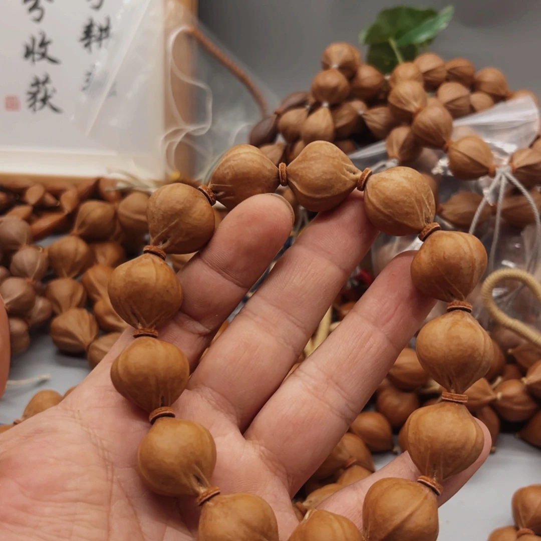 ，***。橄榄核手串/手链蜜桃