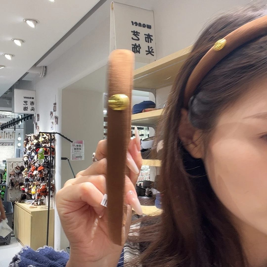 布艺非金属咖色笑脸发箍