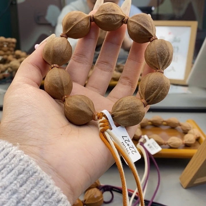 吊坠橄榄核花***?梅林铁