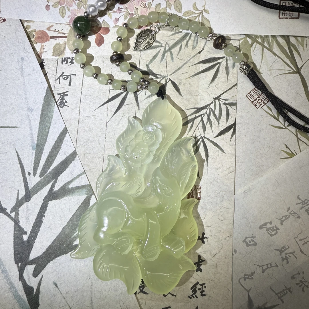 手工雕刻岫玉九尾毛衣链
