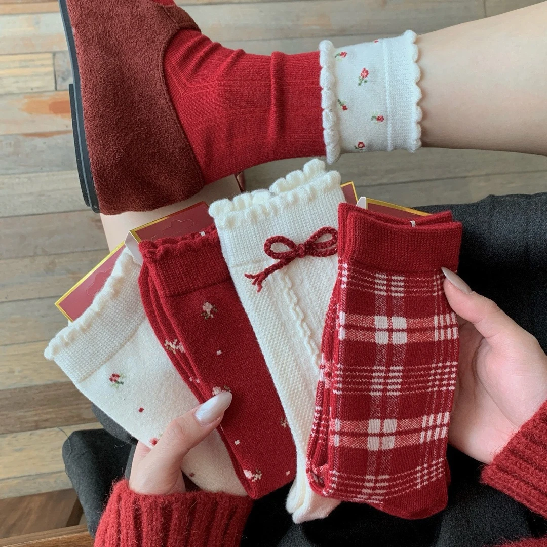 秋冬本命年红色蝴蝶结可爱加厚保暖中筒堆堆袜子女日系风