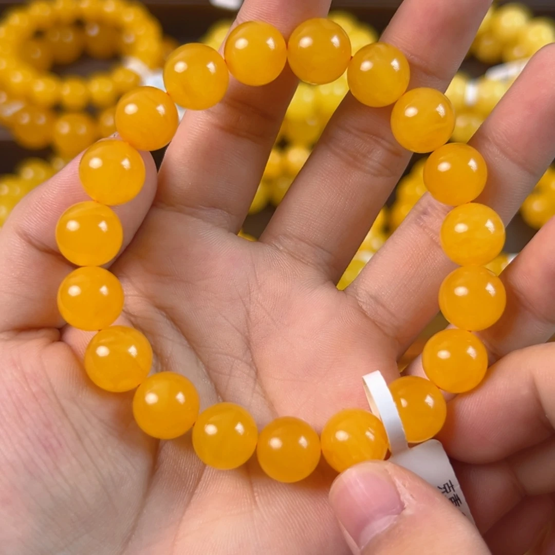 琥珀未镶嵌手串16.86g焦皮同料圆珠11mm tt