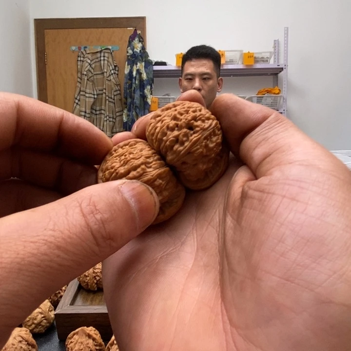 。***酒文玩核桃吊坠白狮子