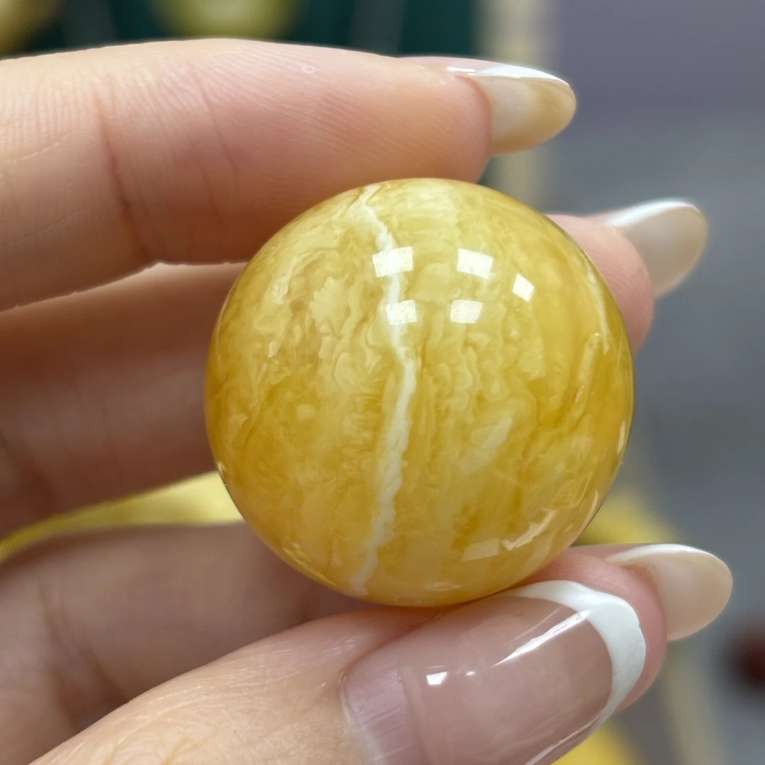 25.0mm瑕疵（上下手掐位打好孔了）·小妖珠宝天然原矿琥珀蜜蜡