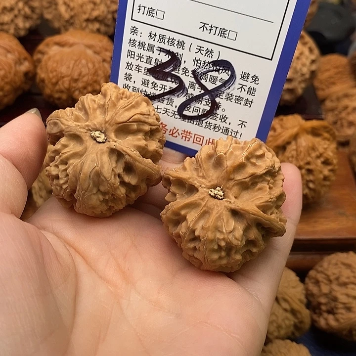 吊坠桃核苹果园狮子头40