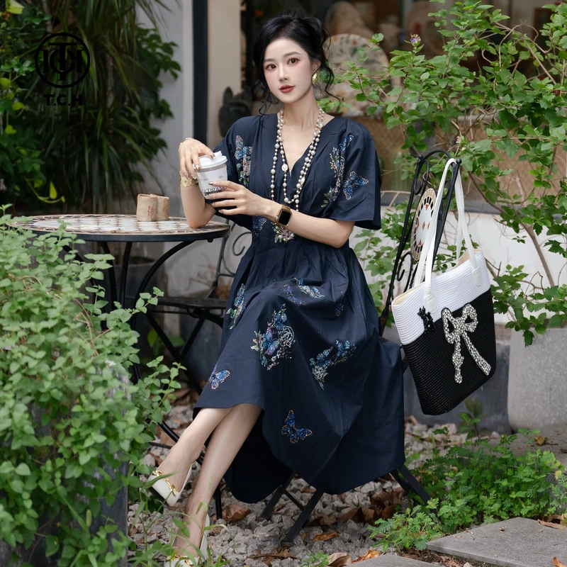 年终大促款TCH私服秋款烫钻时尚休闲气质蝴蝶连衣裙女T75C30E1006