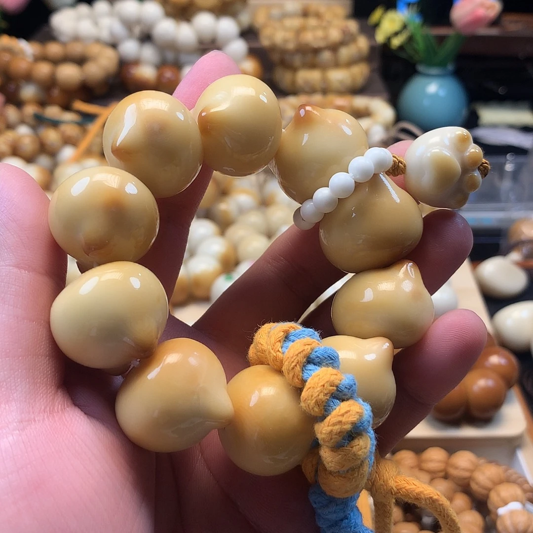 吊坠菩提根/象牙果奶黄猫头