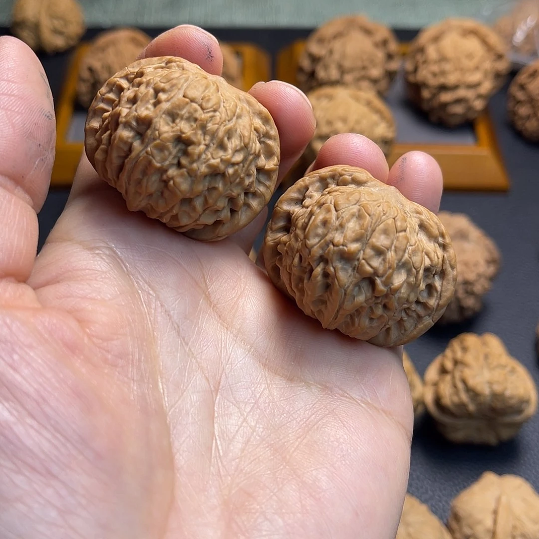 桃核把件全品柿子磨盘39。 孟