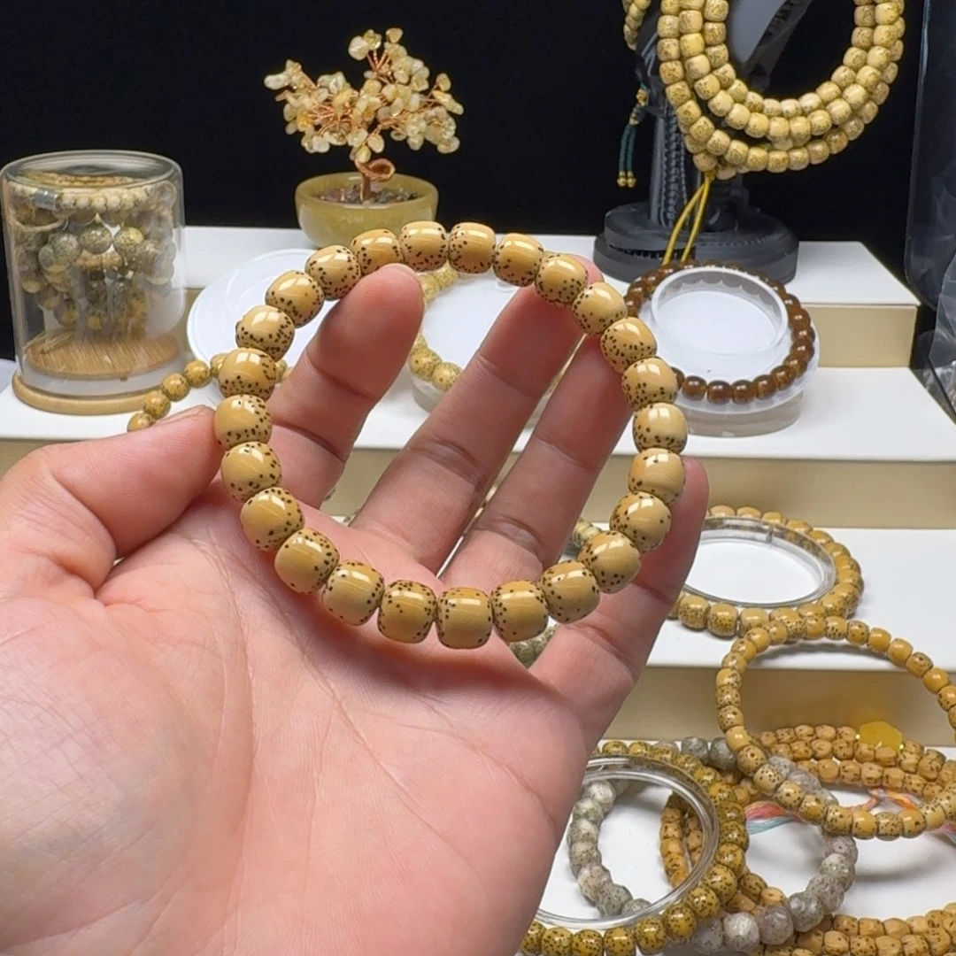 A***司星月菩提手串原白通体双金标单圈