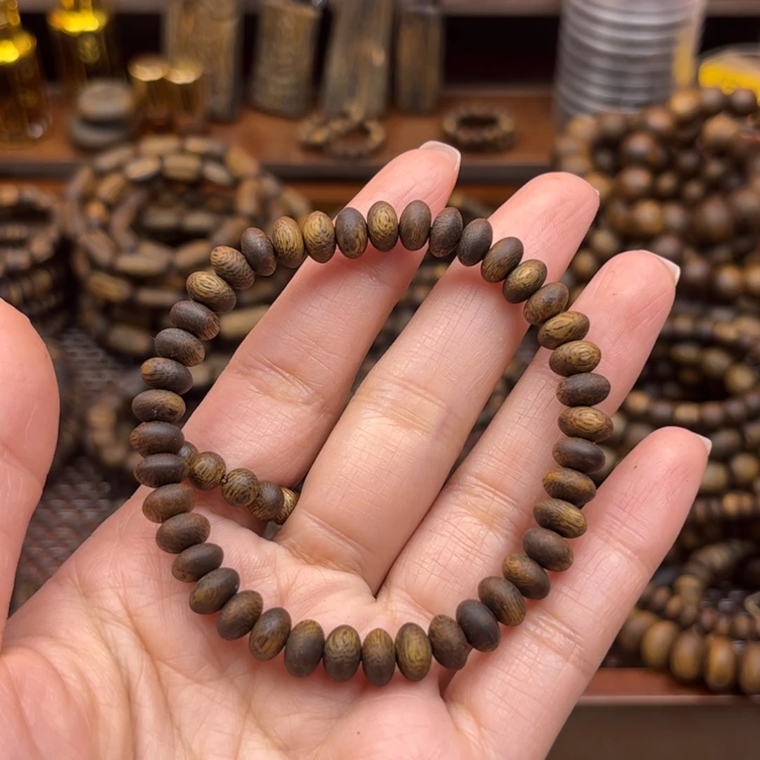 沉香碎屑奇楠0.7算盘珠单圈